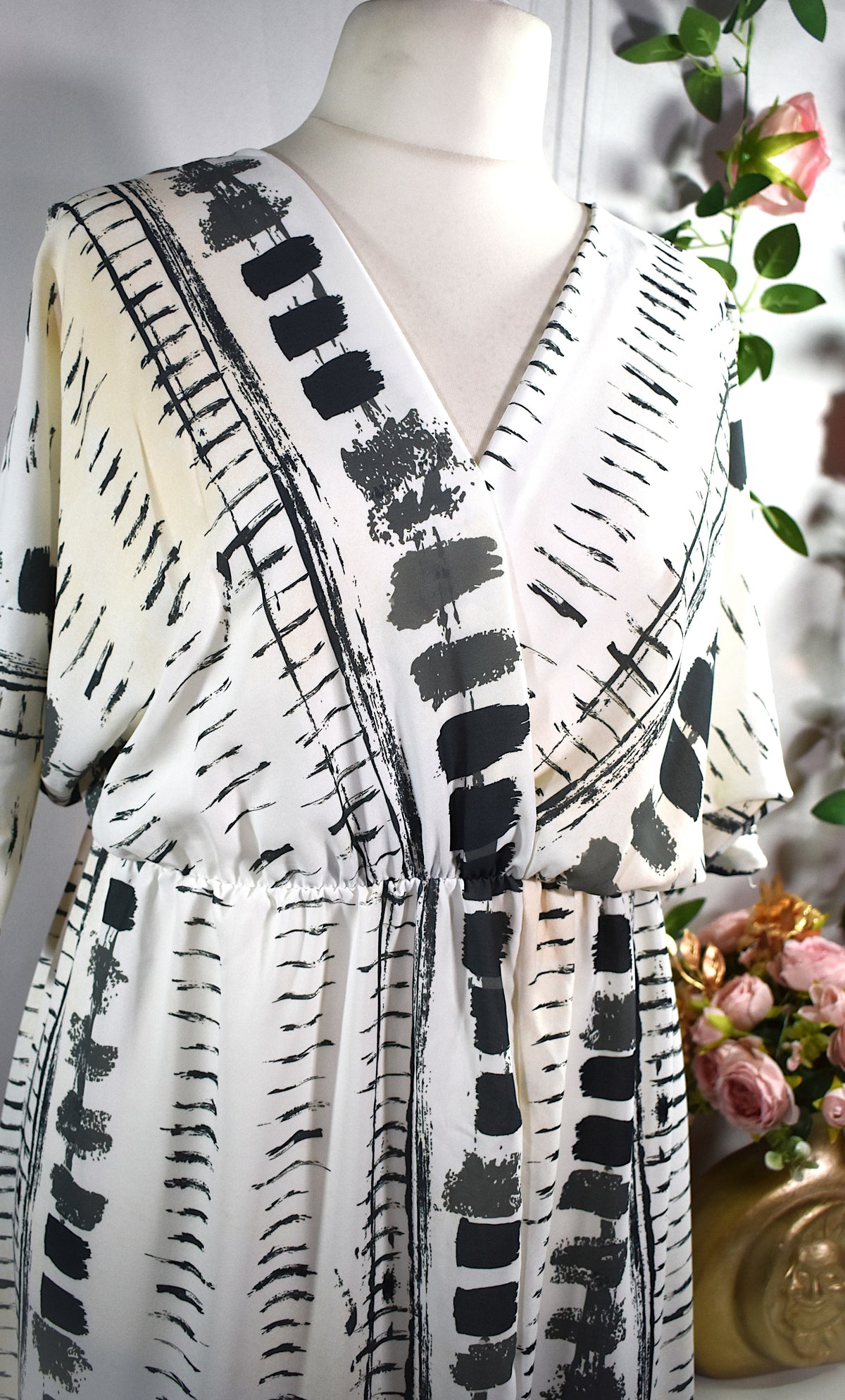 Robe longue blanche à motifs