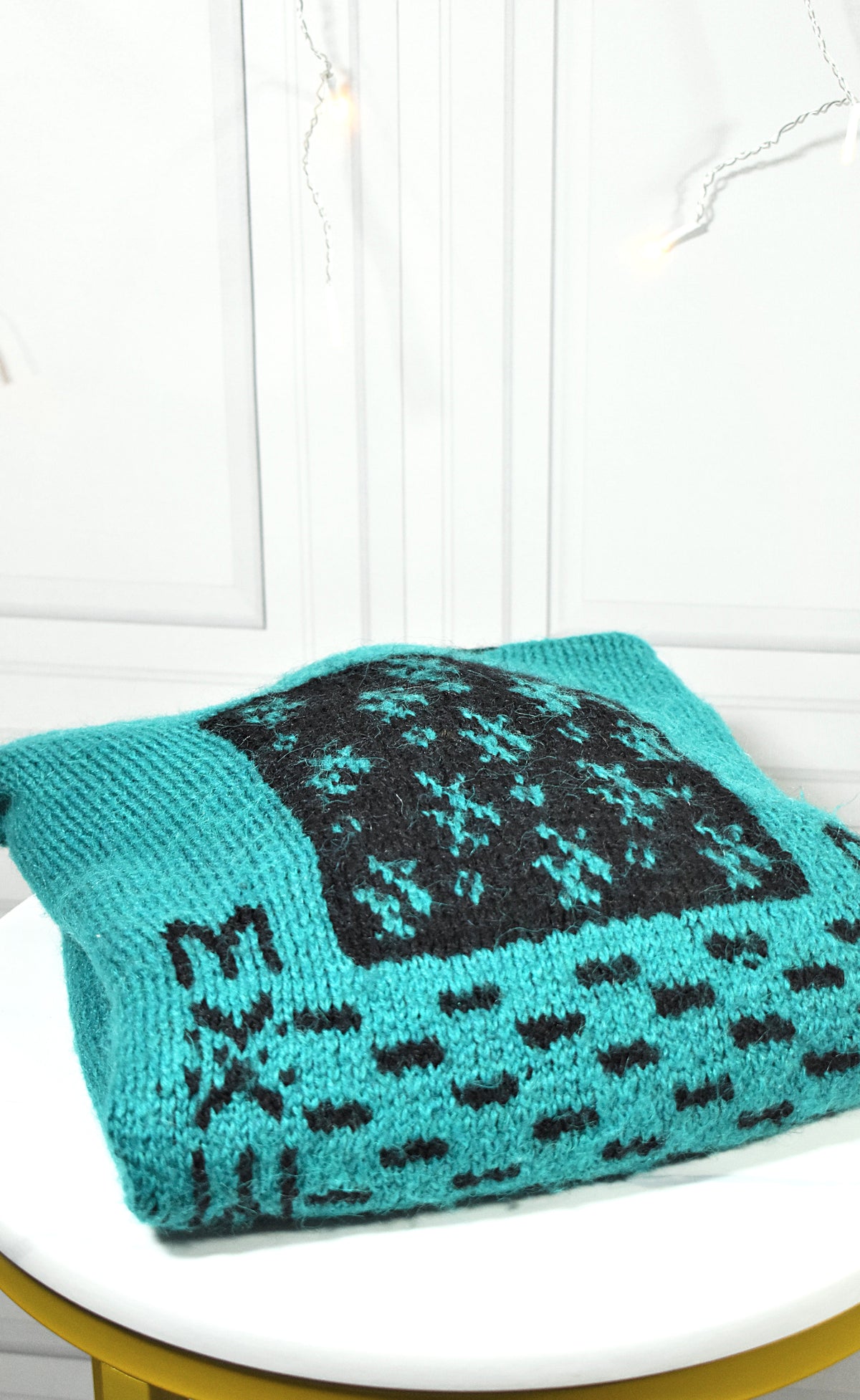 Pull-over vert viride aux motifs noirs