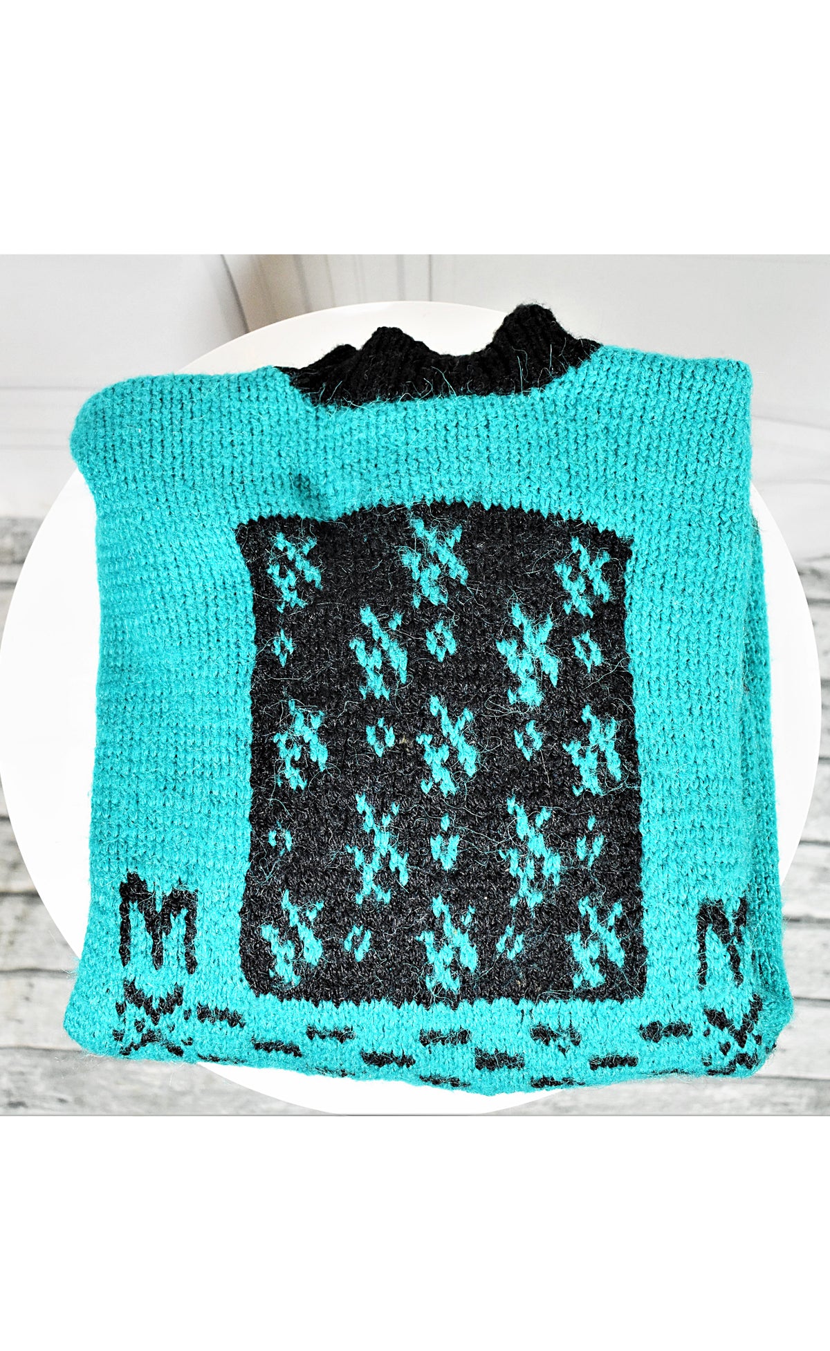Pull-over vert viride aux motifs noirs