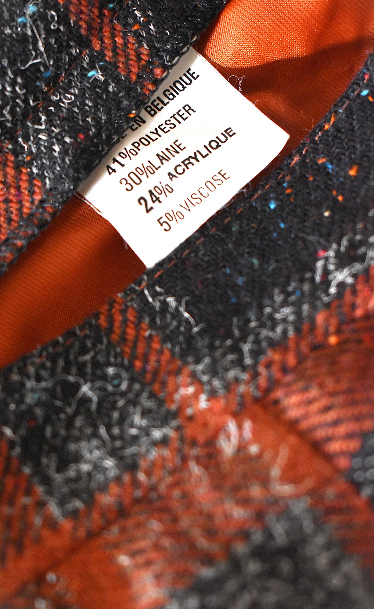 Jupe mi-longue plissée laine carreaux orange et gris