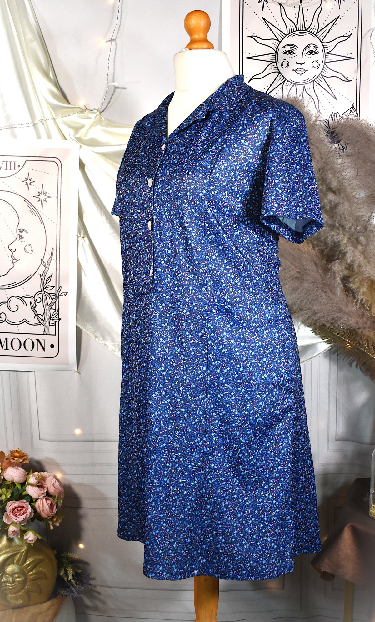 Robe rétro fleurie bleue avec poches