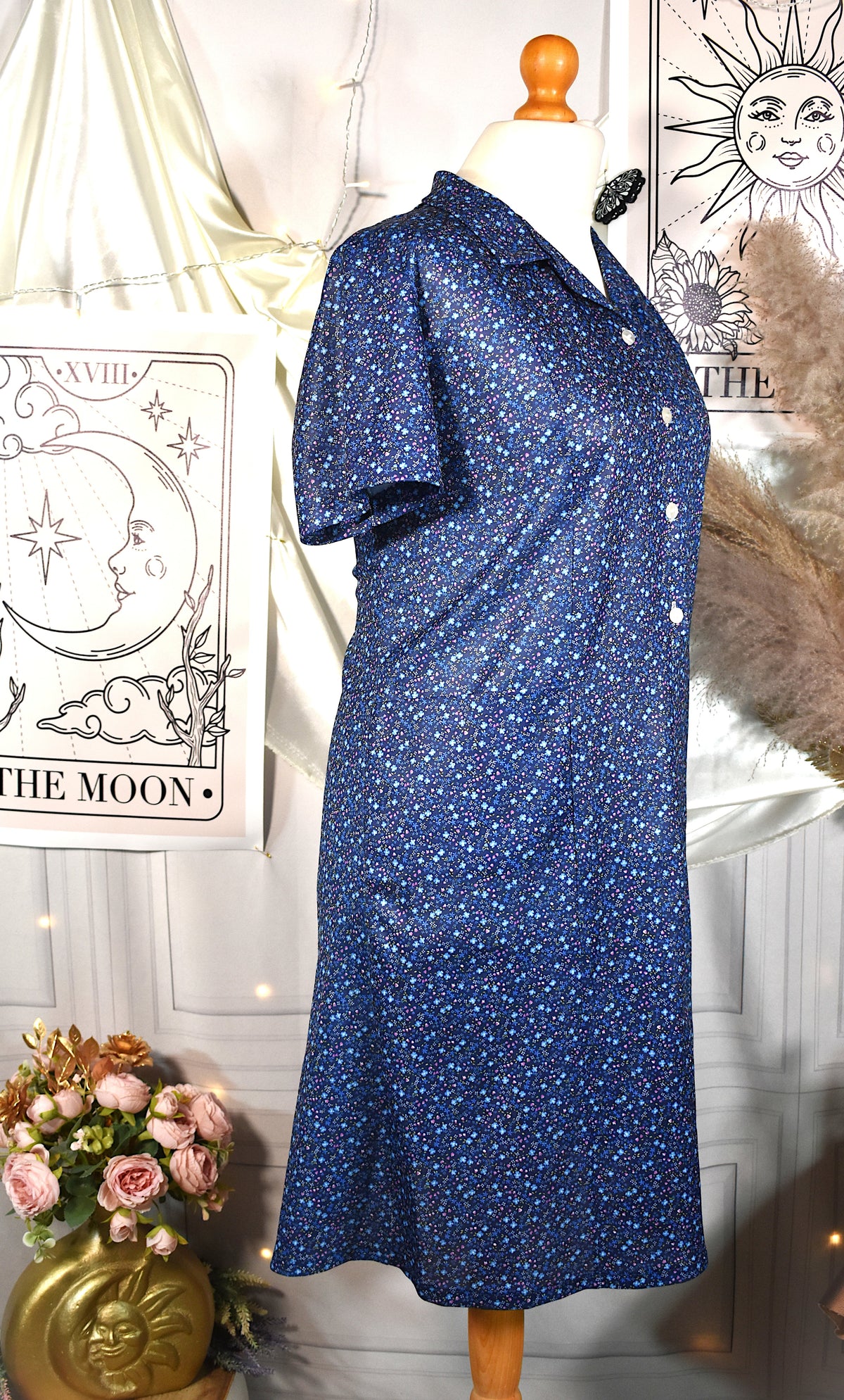 Robe rétro fleurie bleue avec poches