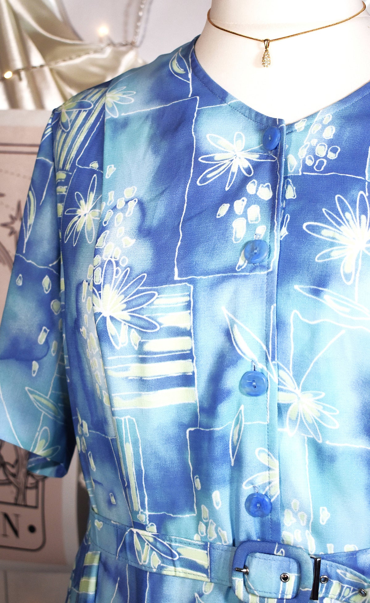 Robe fleurie géométrique bleu vert pastel