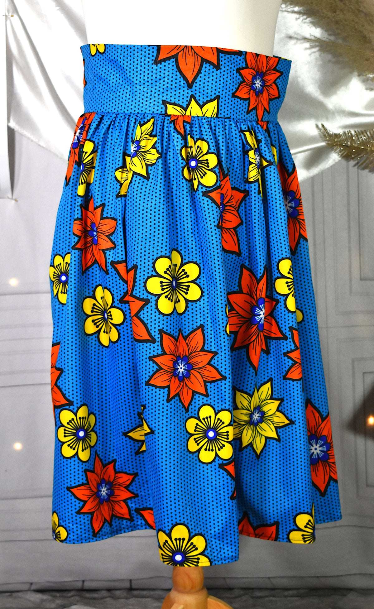 Jupe midi style wax turquoise fleurs jaunes oranges avec sac